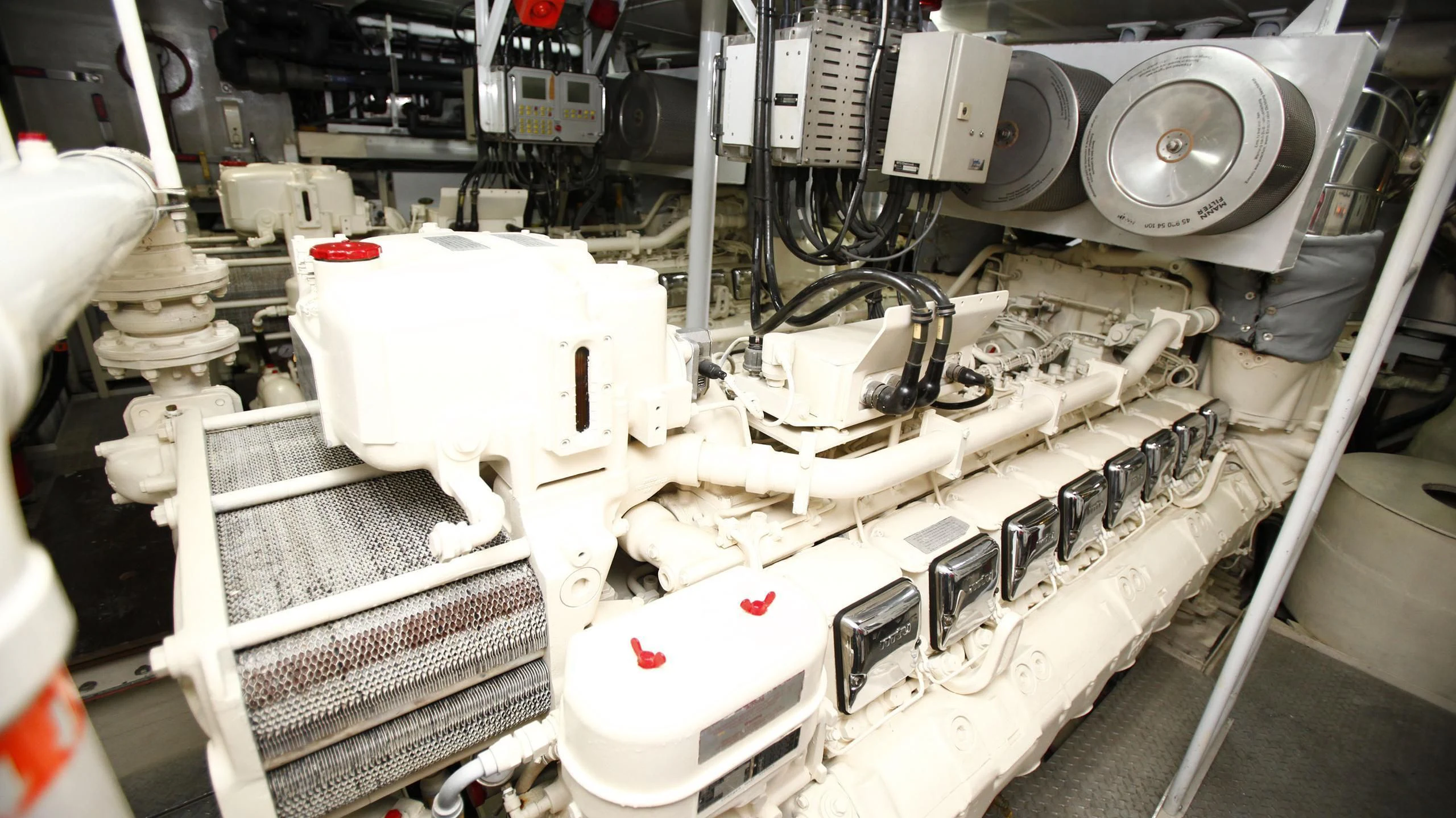 a machine with a large white object aboard TAMTEEN Yacht for Sale