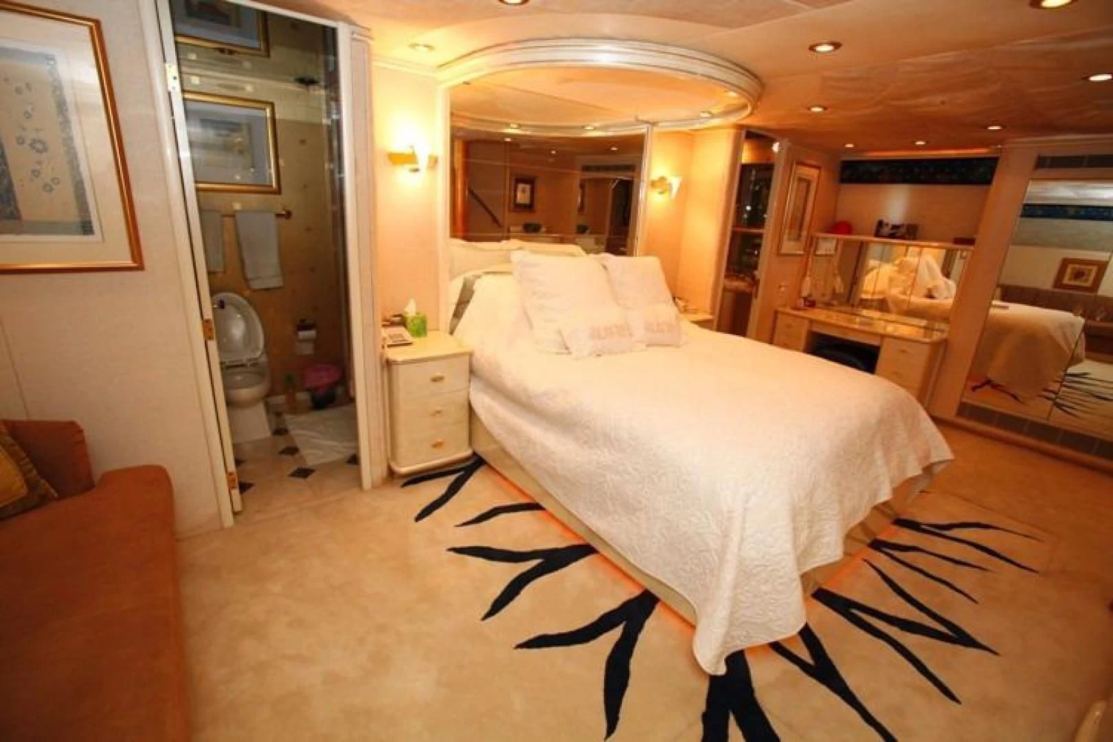 a bedroom with a bed aboard TAMTEEN Yacht for Sale