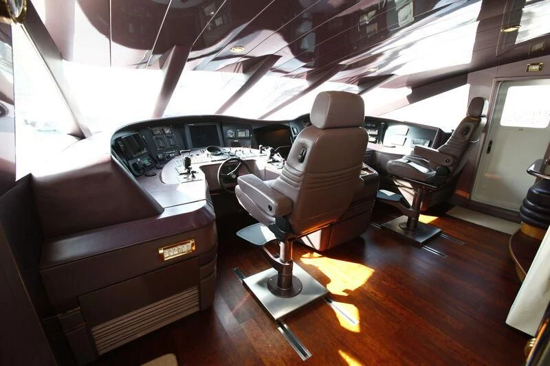 a room with a desk and a chair aboard TAMTEEN Yacht for Sale