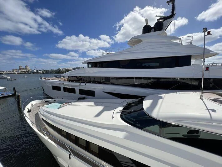 a yacht docked at a pier aboard CALEX Yacht for Sale