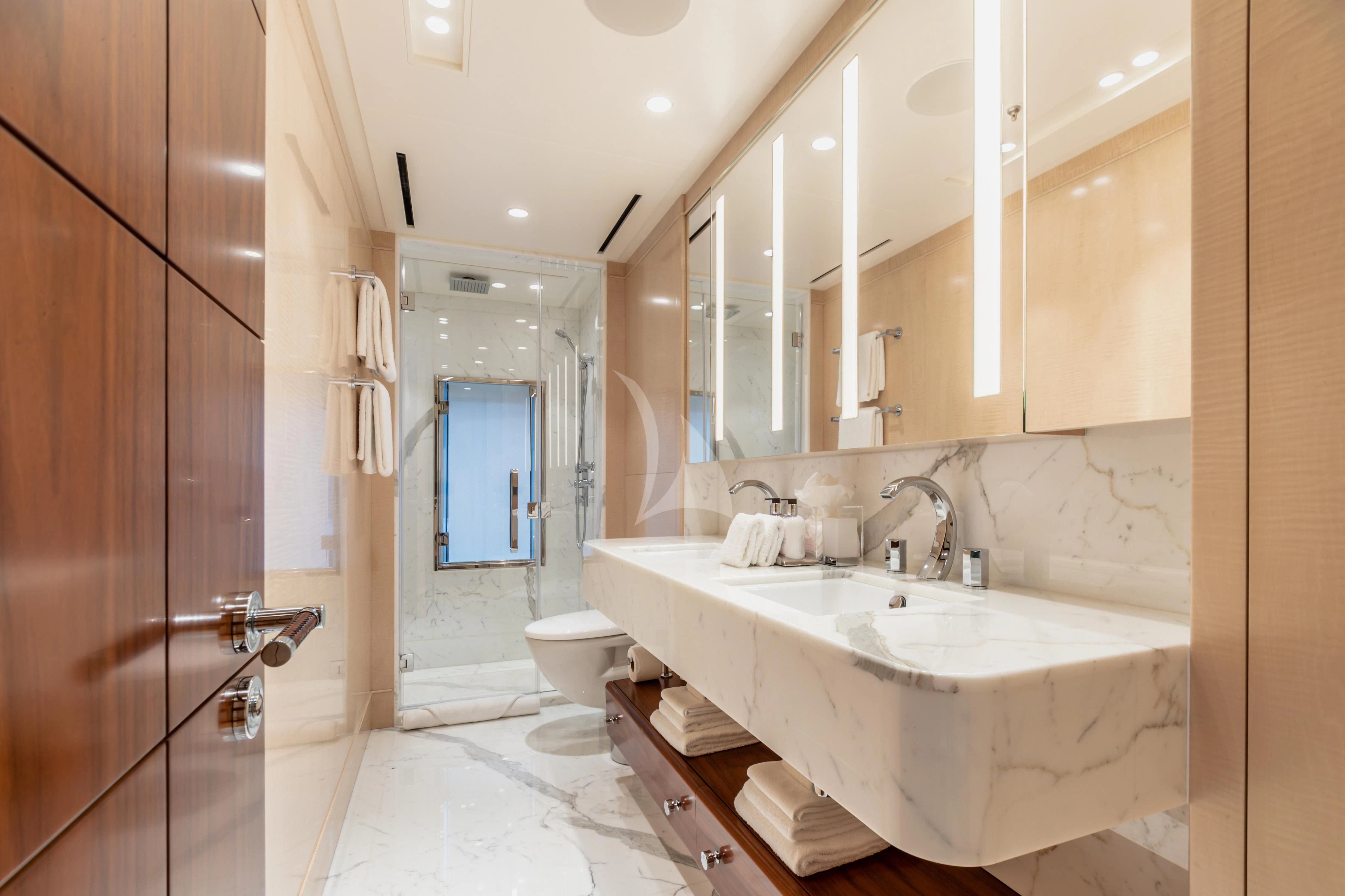 a bathroom with a sink and a toilet aboard CALEX Yacht for Sale