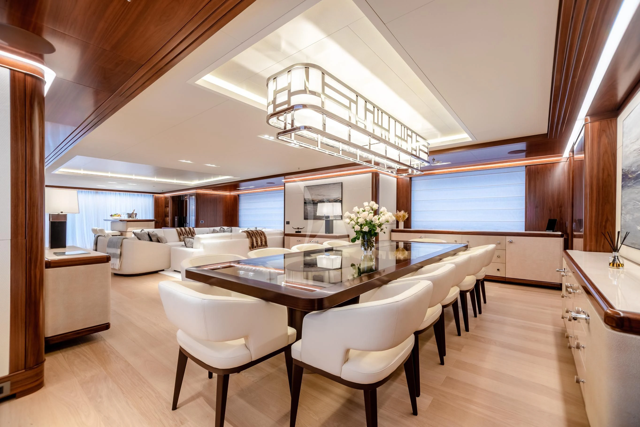 a large open kitchen and dining area aboard CALEX Yacht for Sale