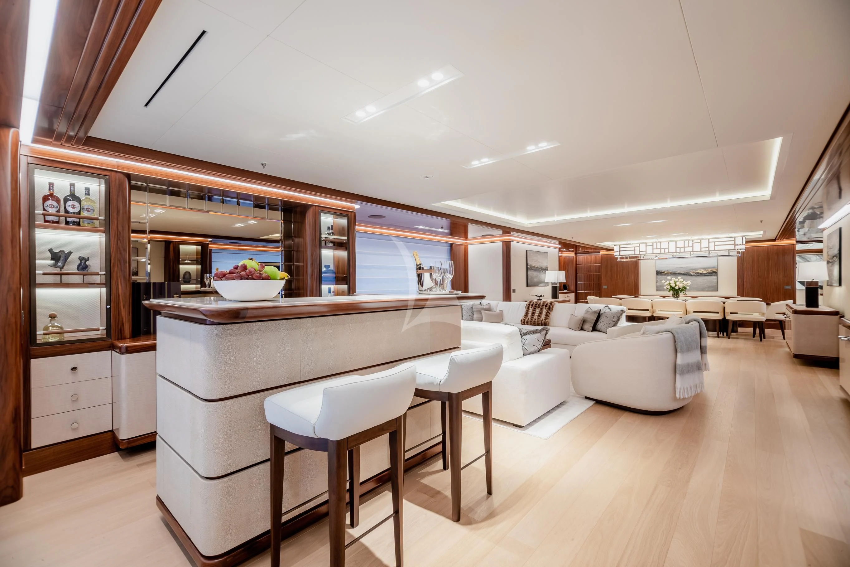 a large kitchen with a large island aboard CALEX Yacht for Sale