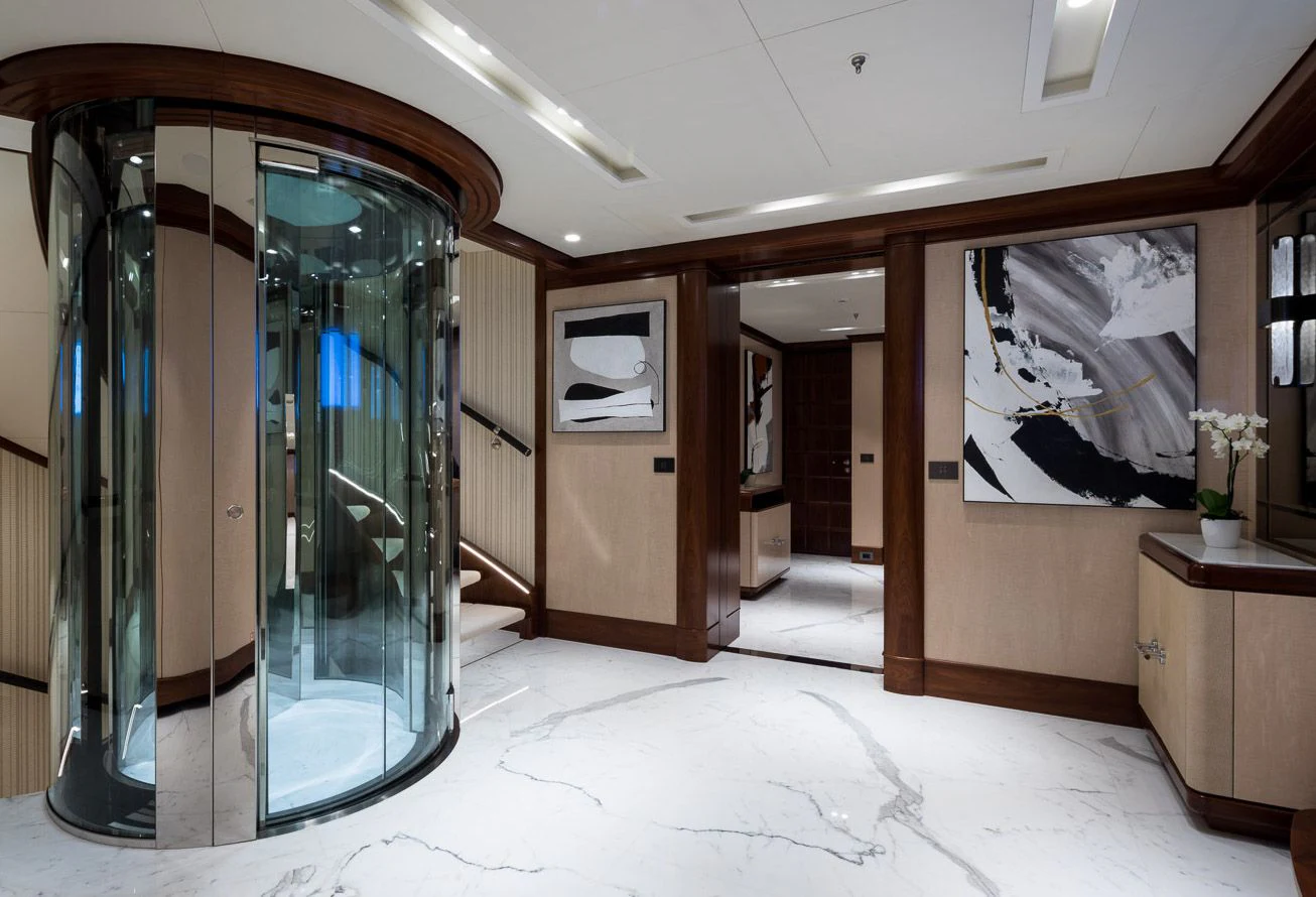 a large glass door in a room aboard CALEX Yacht for Sale