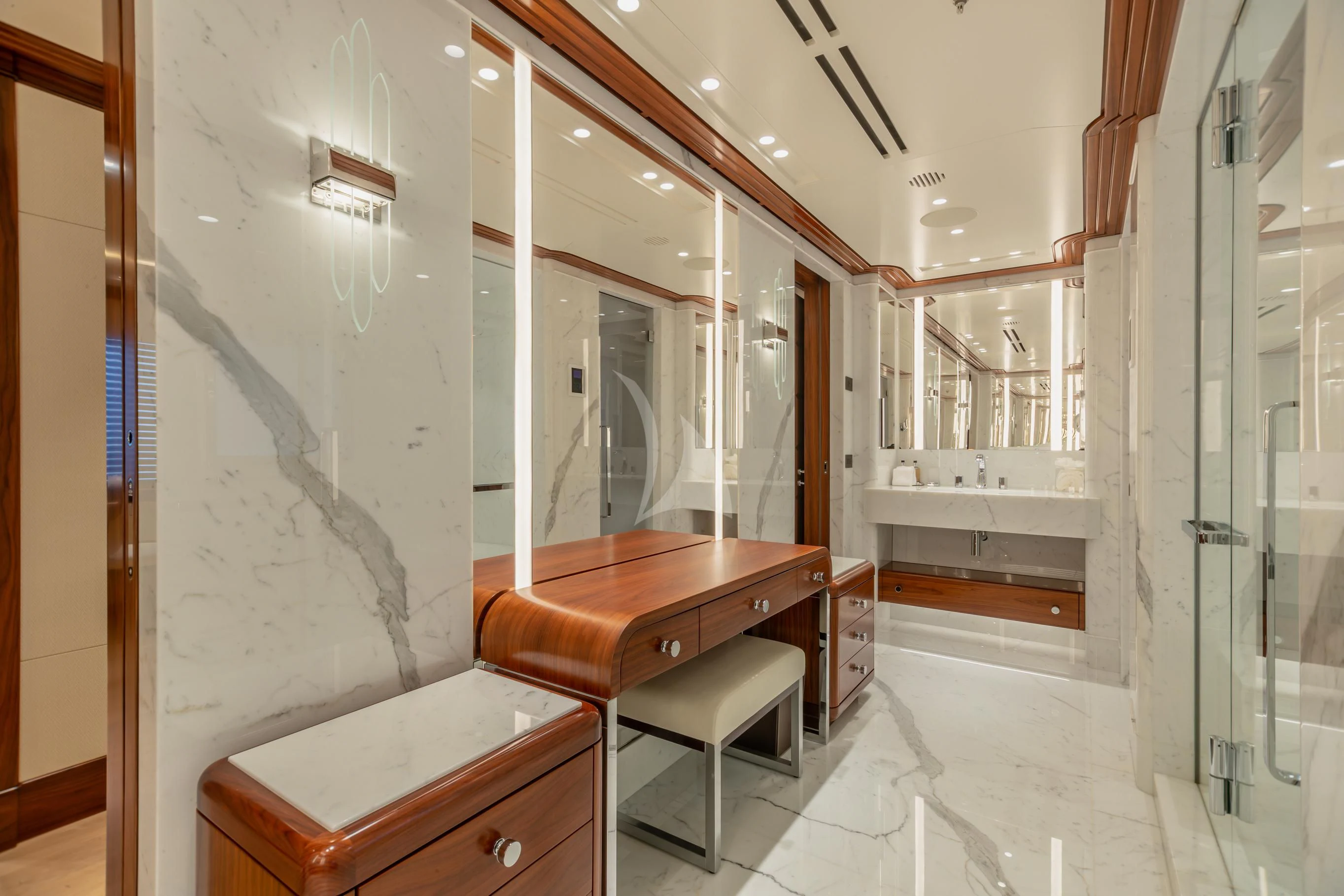 a room with a desk and a chair aboard CALEX Yacht for Sale