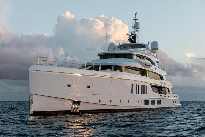 a large white ship in the water aboard CALEX Yacht for Sale