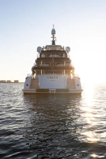 a large ship in the water aboard CALEX Yacht for Sale