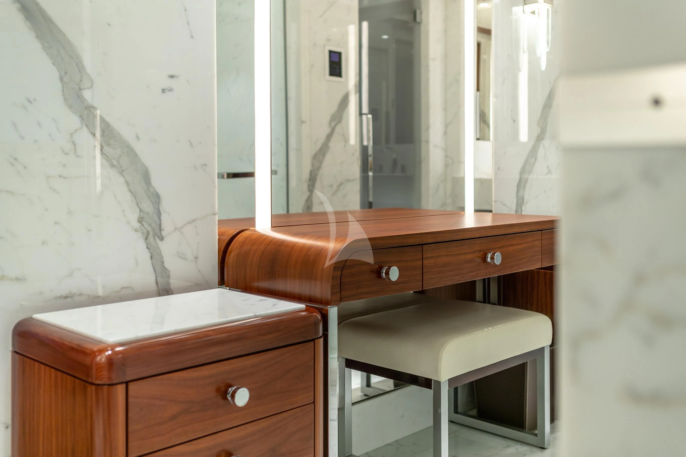 a room with a desk and a chair aboard CALEX Yacht for Sale