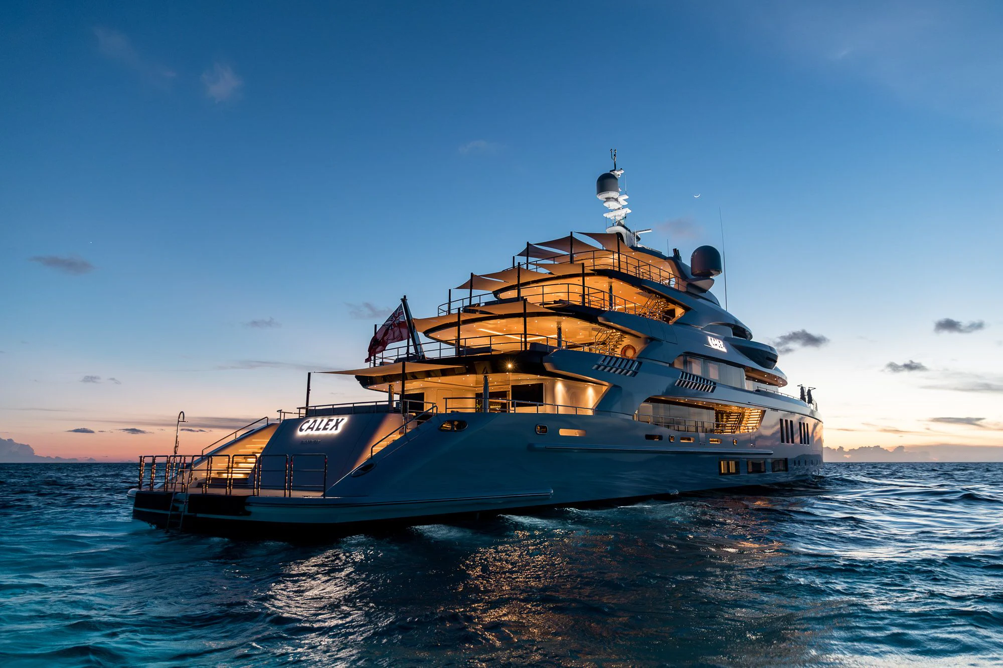 a large boat in the water aboard CALEX Yacht for Sale
