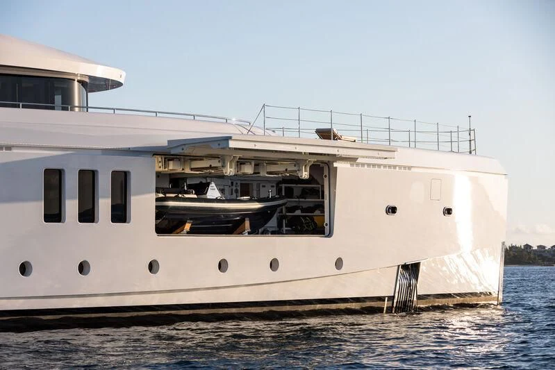 a large white boat on the water aboard CALEX Yacht for Sale
