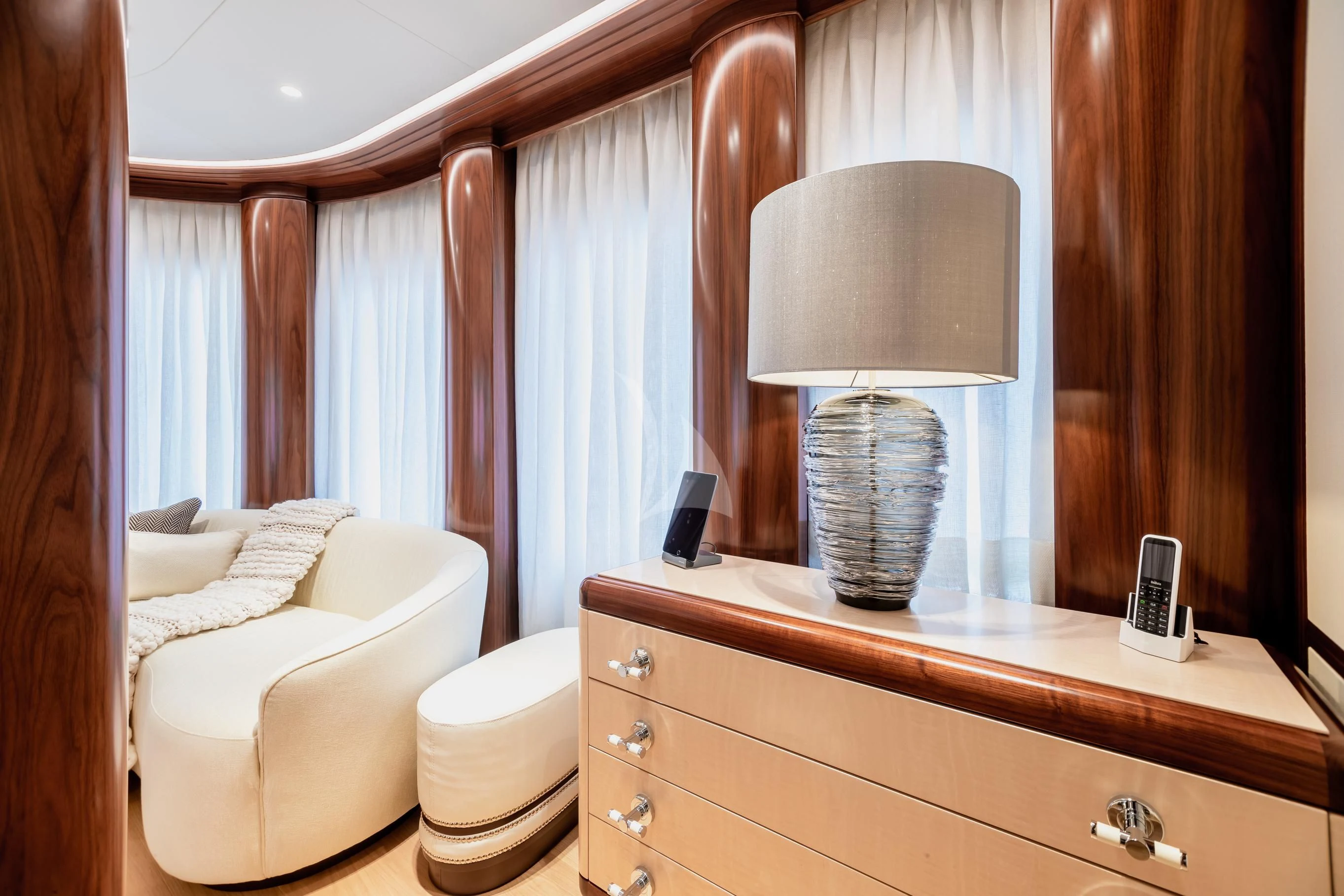 a room with a lamp and a bed aboard CALEX Yacht for Sale
