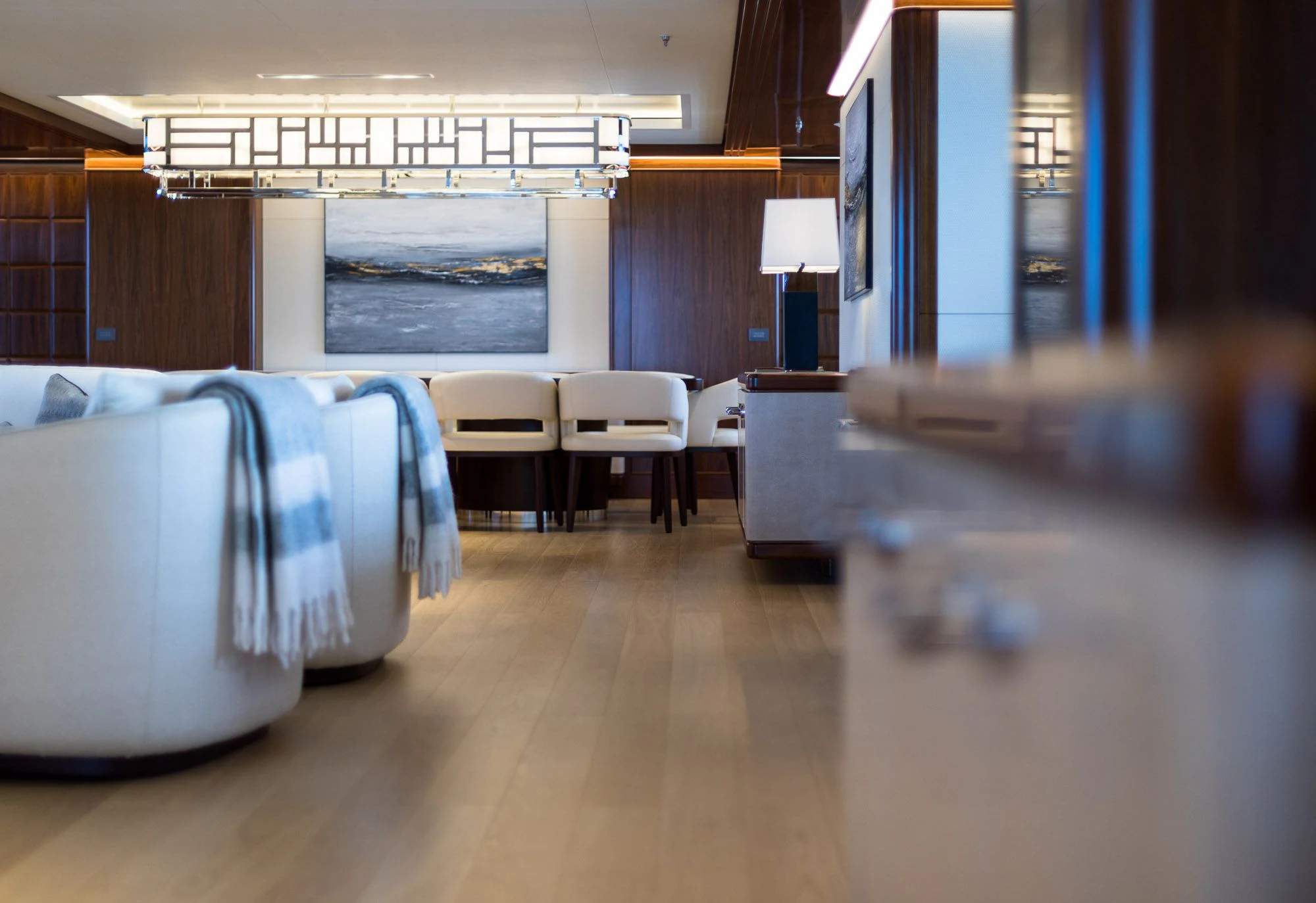 a room with a bed and a couch aboard CALEX Yacht for Sale