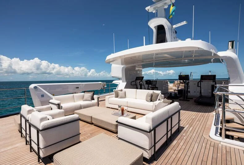 a large white boat on a deck aboard CALEX Yacht for Sale