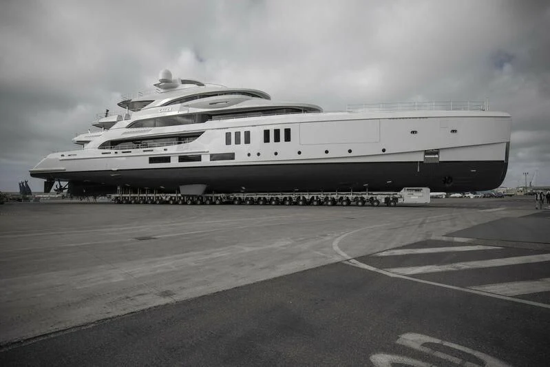 a large cruise ship docked aboard CALEX Yacht for Sale