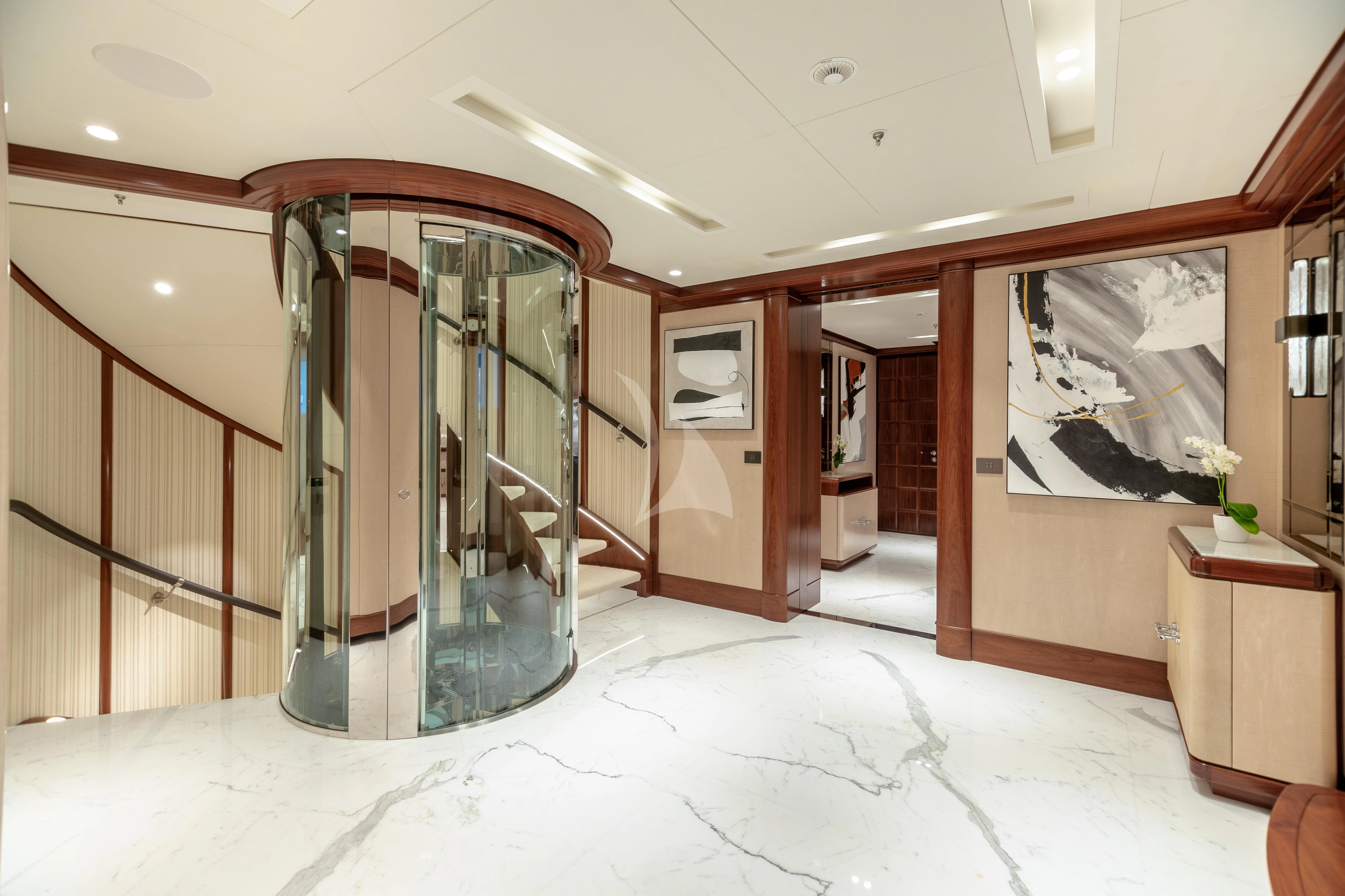 a room with a large mirror aboard CALEX Yacht for Sale