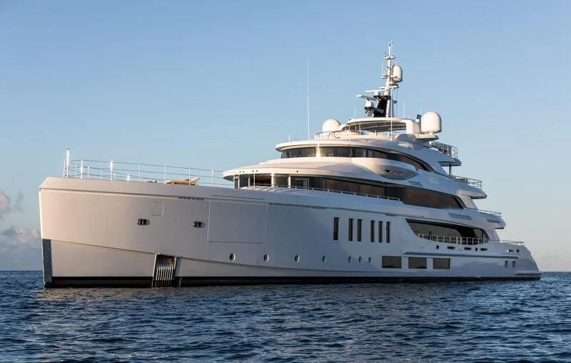 a large white ship in the water aboard CALEX Yacht for Sale