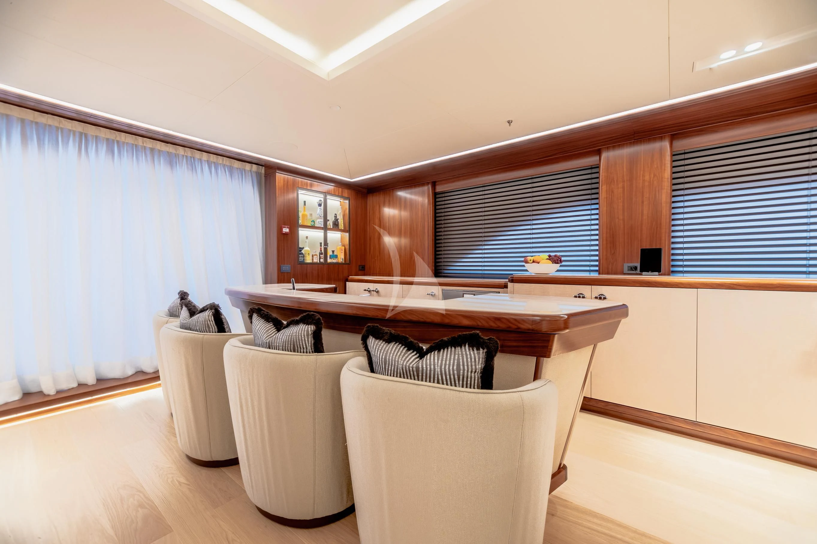 a room with a couch and a table aboard CALEX Yacht for Sale