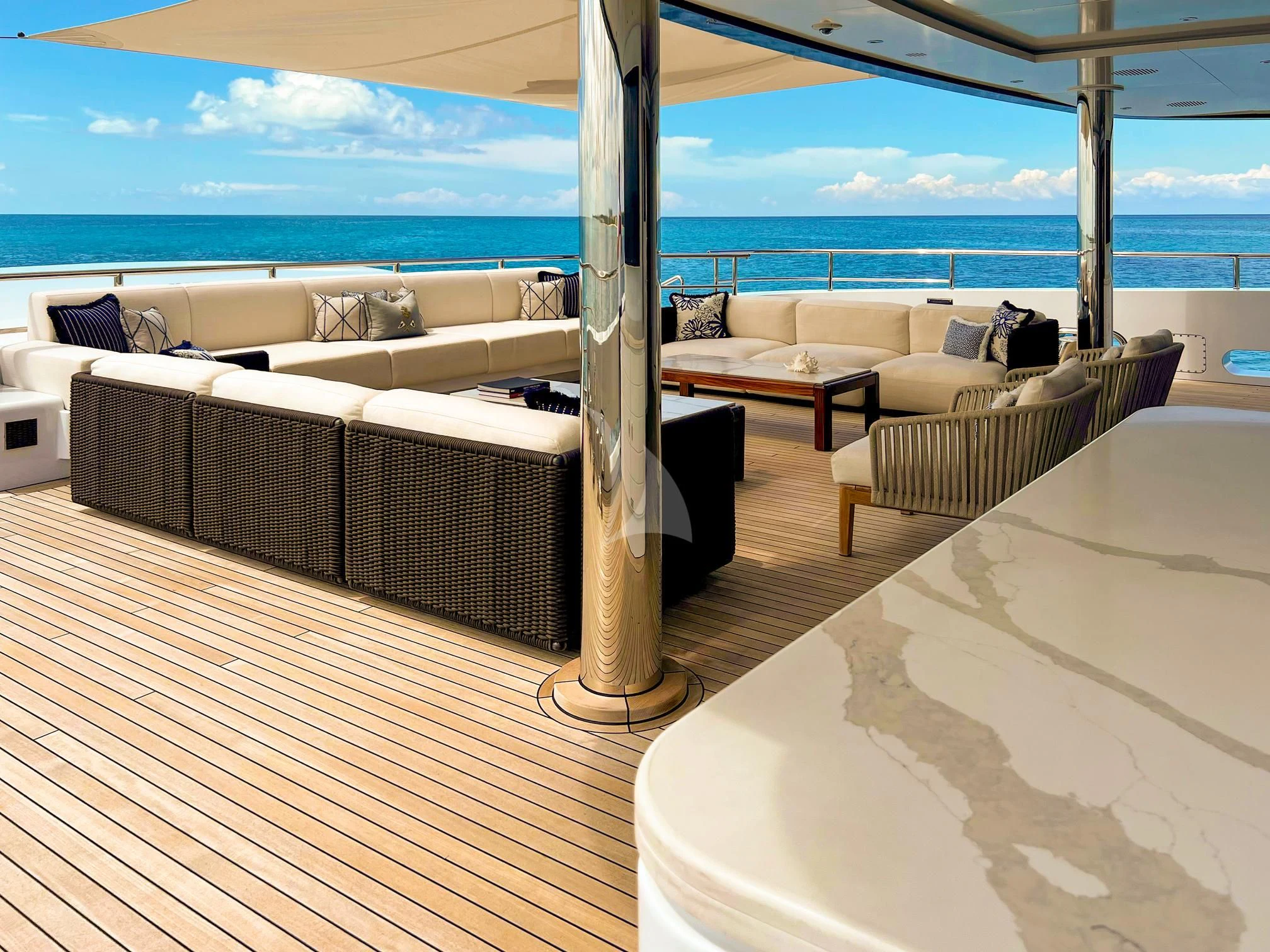 a room with a bed and a table aboard CALEX Yacht for Sale