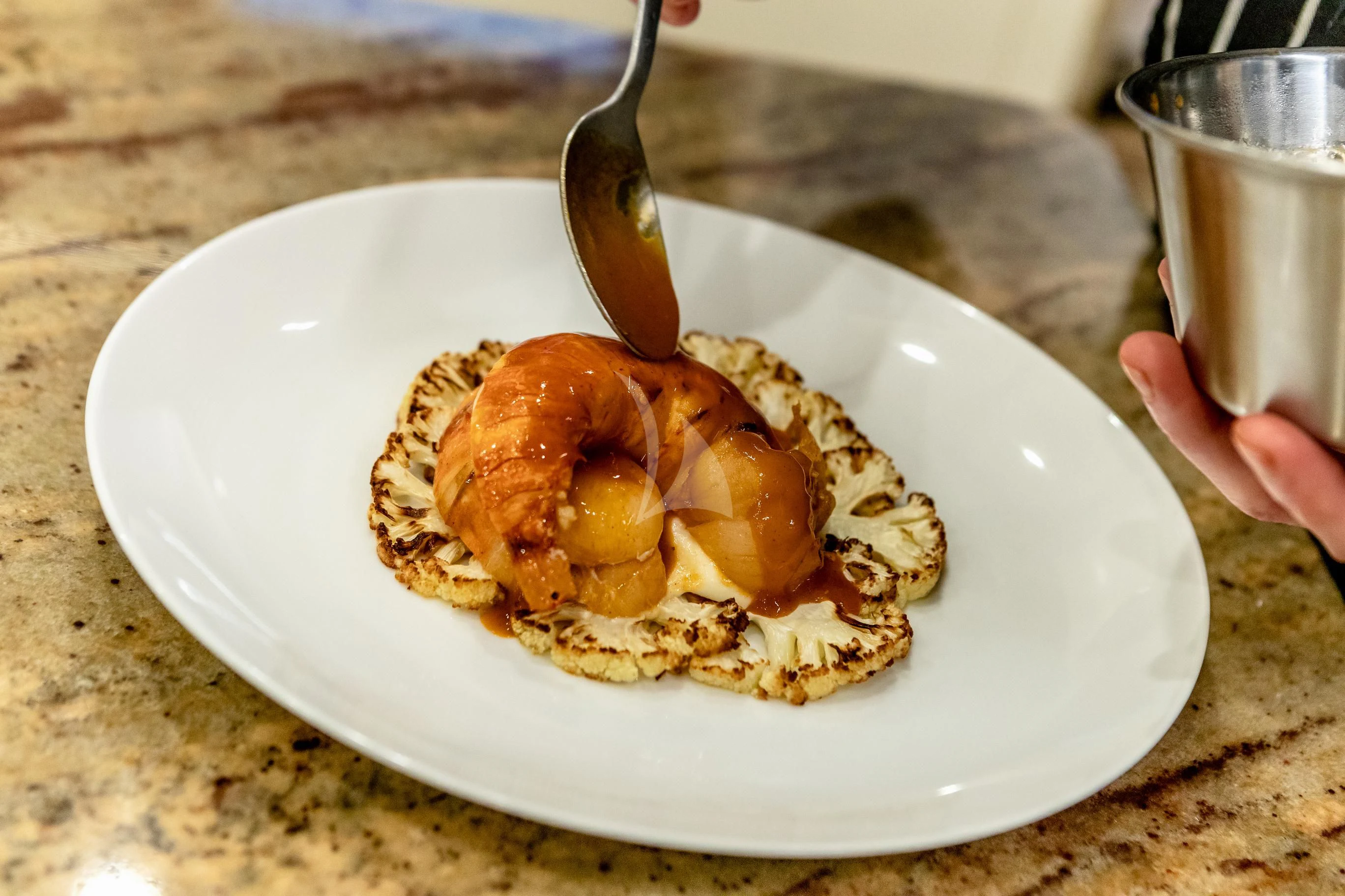 a plate of food aboard CALEX Yacht for Sale