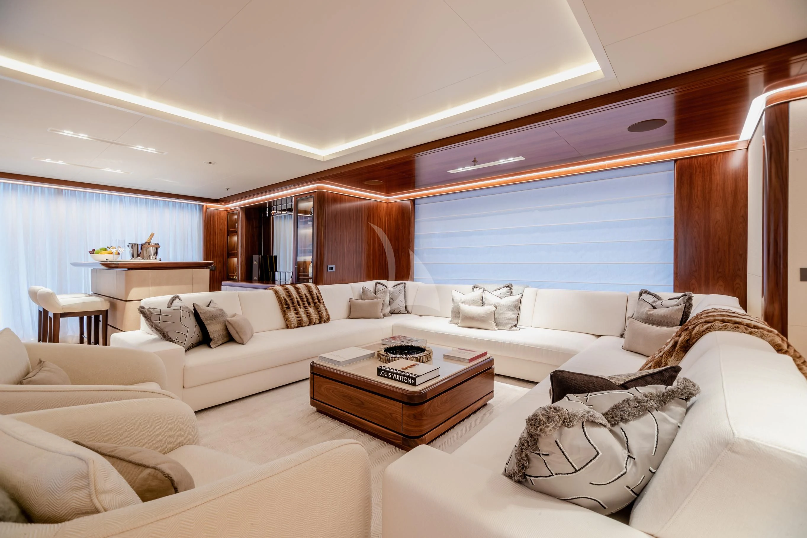 a modern looking living room aboard CALEX Yacht for Sale