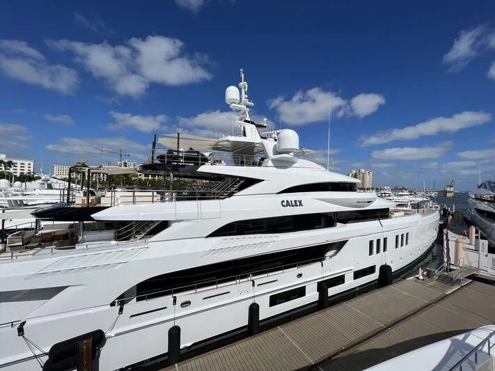 a large yacht docked aboard CALEX Yacht for Sale