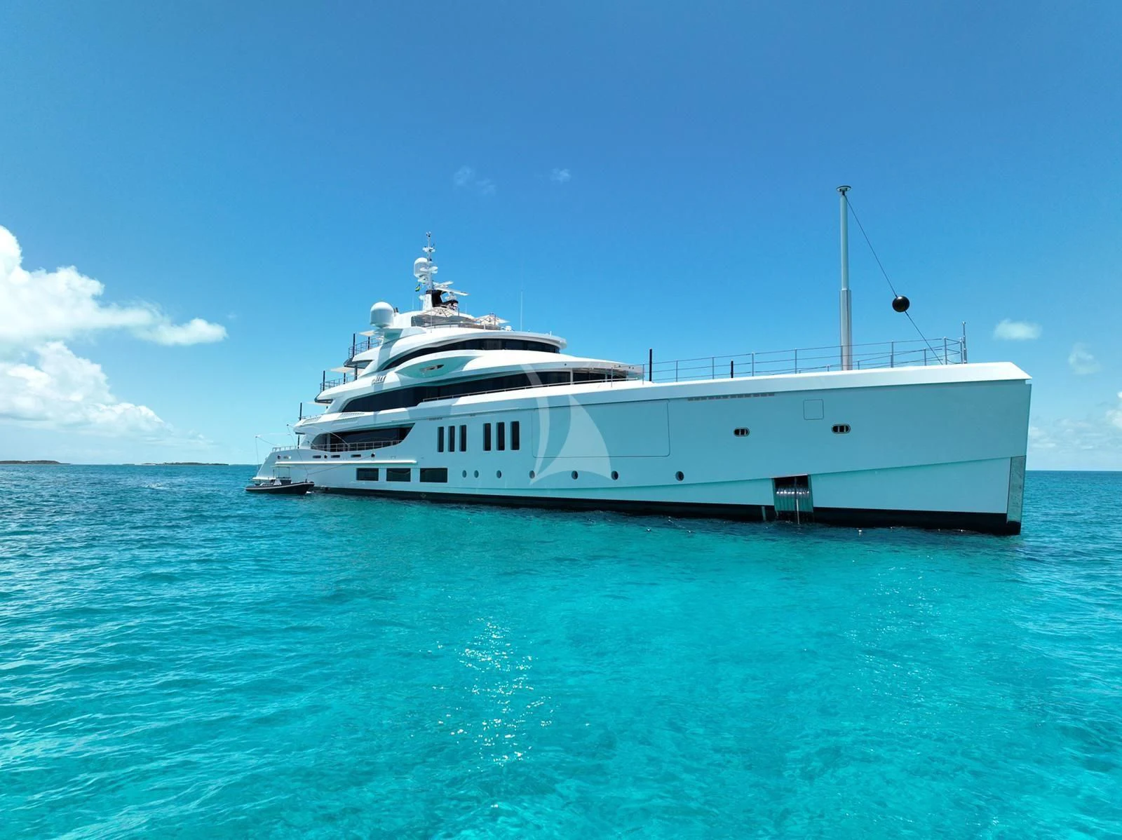 a white yacht in the water aboard CALEX Yacht for Sale