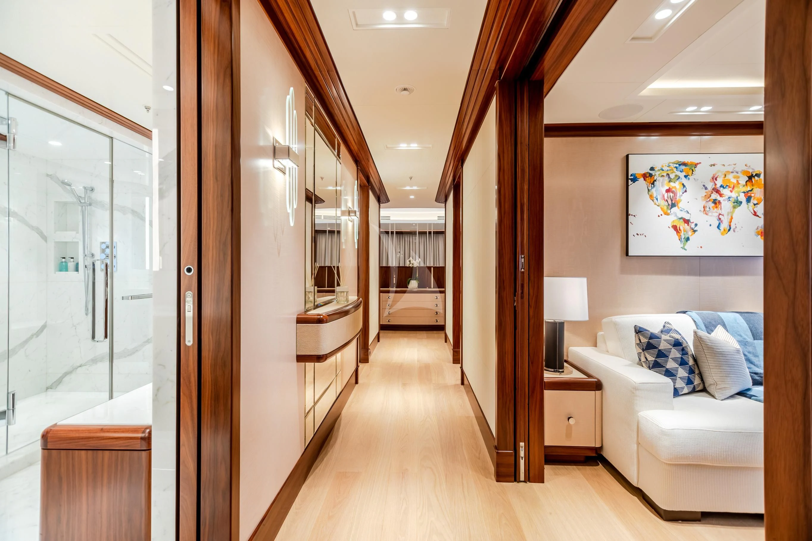a room with a bed and a door aboard CALEX Yacht for Sale