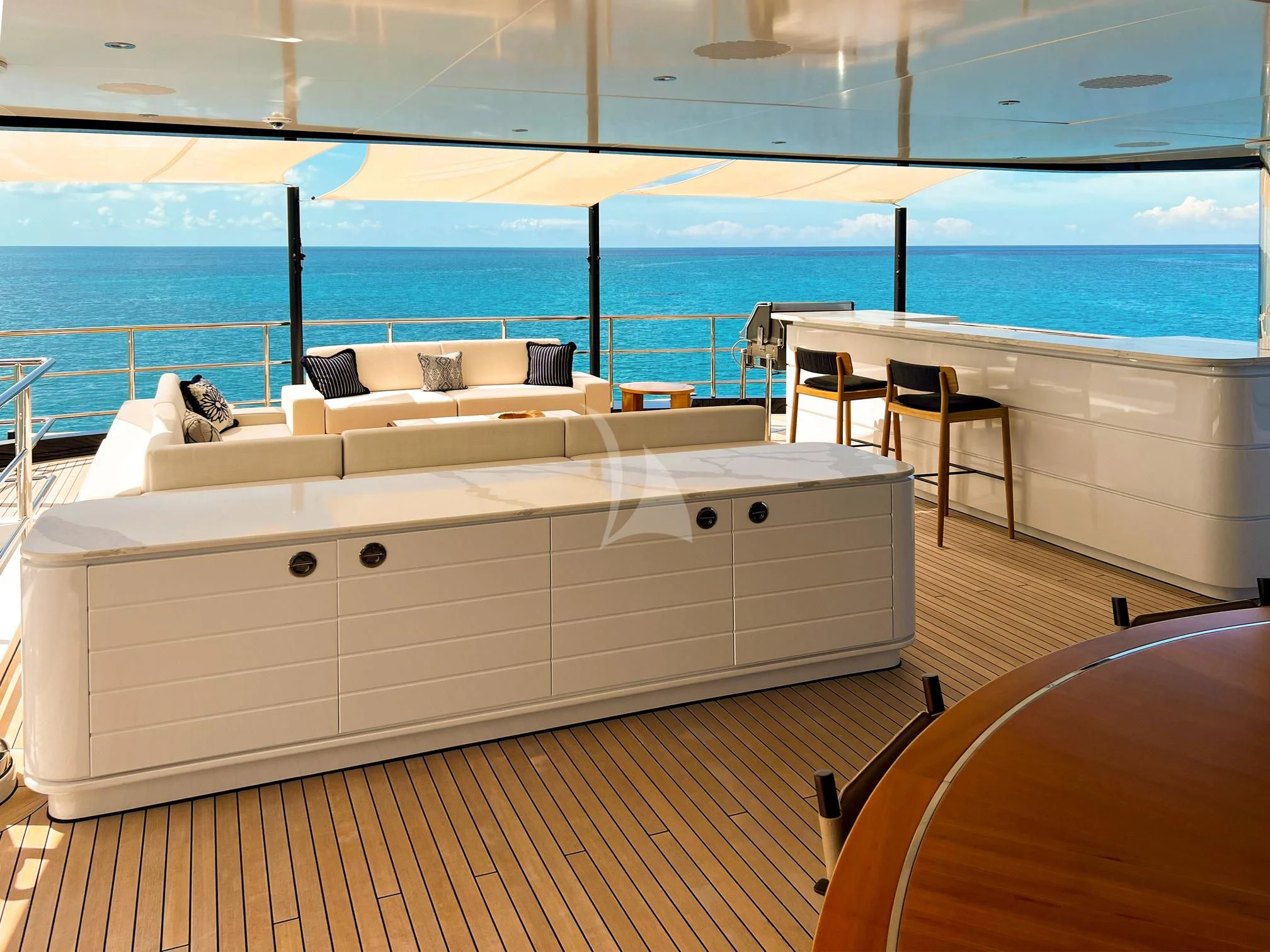 a bed on a deck aboard CALEX Yacht for Sale