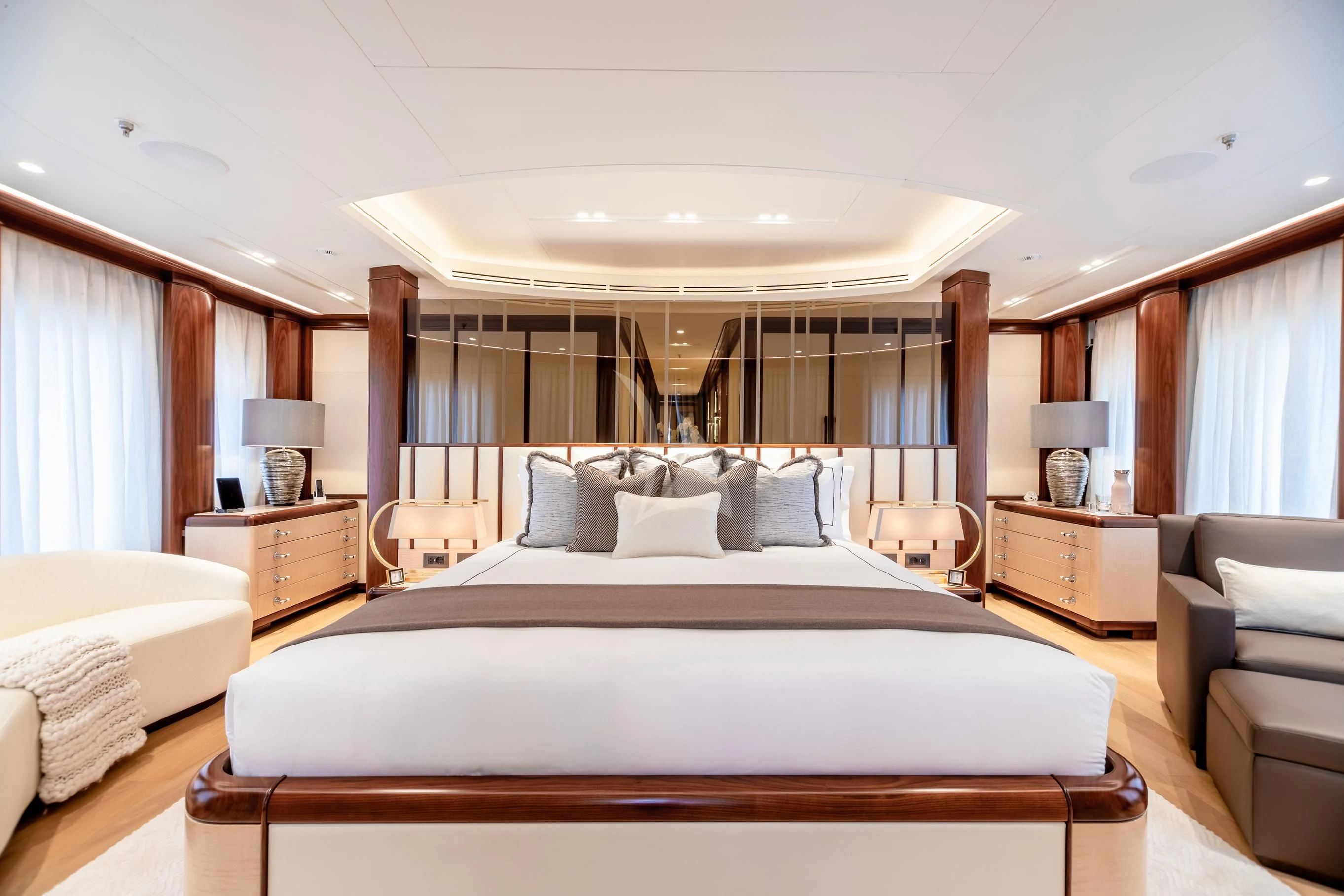 a large bed in a room aboard CALEX Yacht for Sale