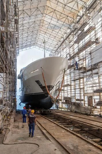 a large machine on a train track aboard MAYBE Yacht for Sale