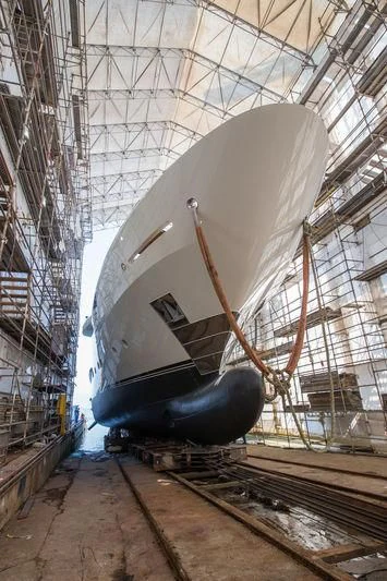 a large metal object in a factory aboard MAYBE Yacht for Sale