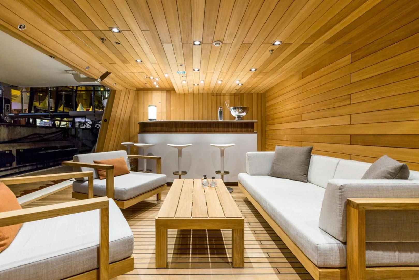 a room with couches and tables aboard MAYBE Yacht for Sale