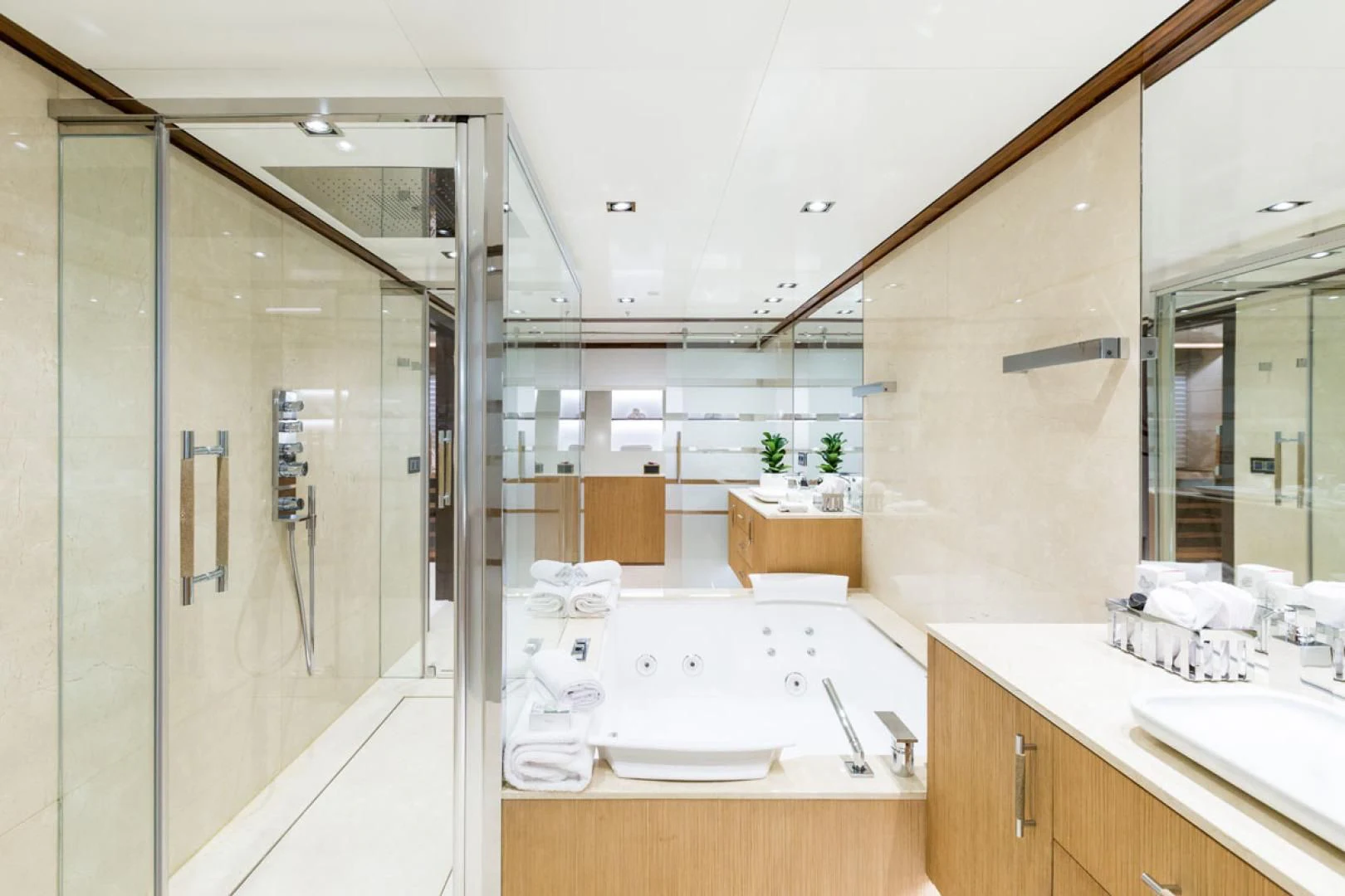 a bathroom with a shower and sink aboard MAYBE Yacht for Sale