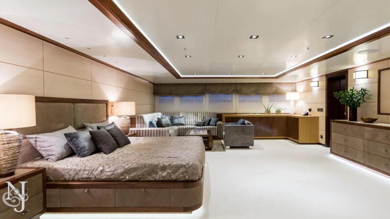 a large bedroom with a large bed aboard MAYBE Yacht for Sale
