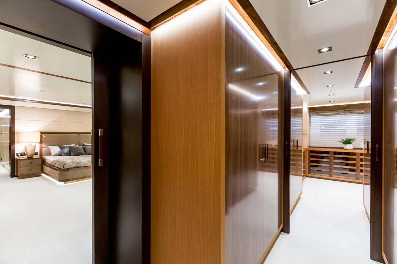 a room with a closet and a bed aboard MAYBE Yacht for Sale