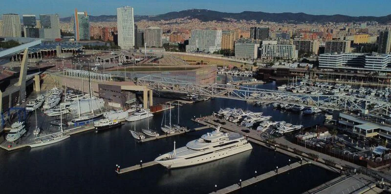 a large city with many buildings and boats aboard MAYBE Yacht for Sale