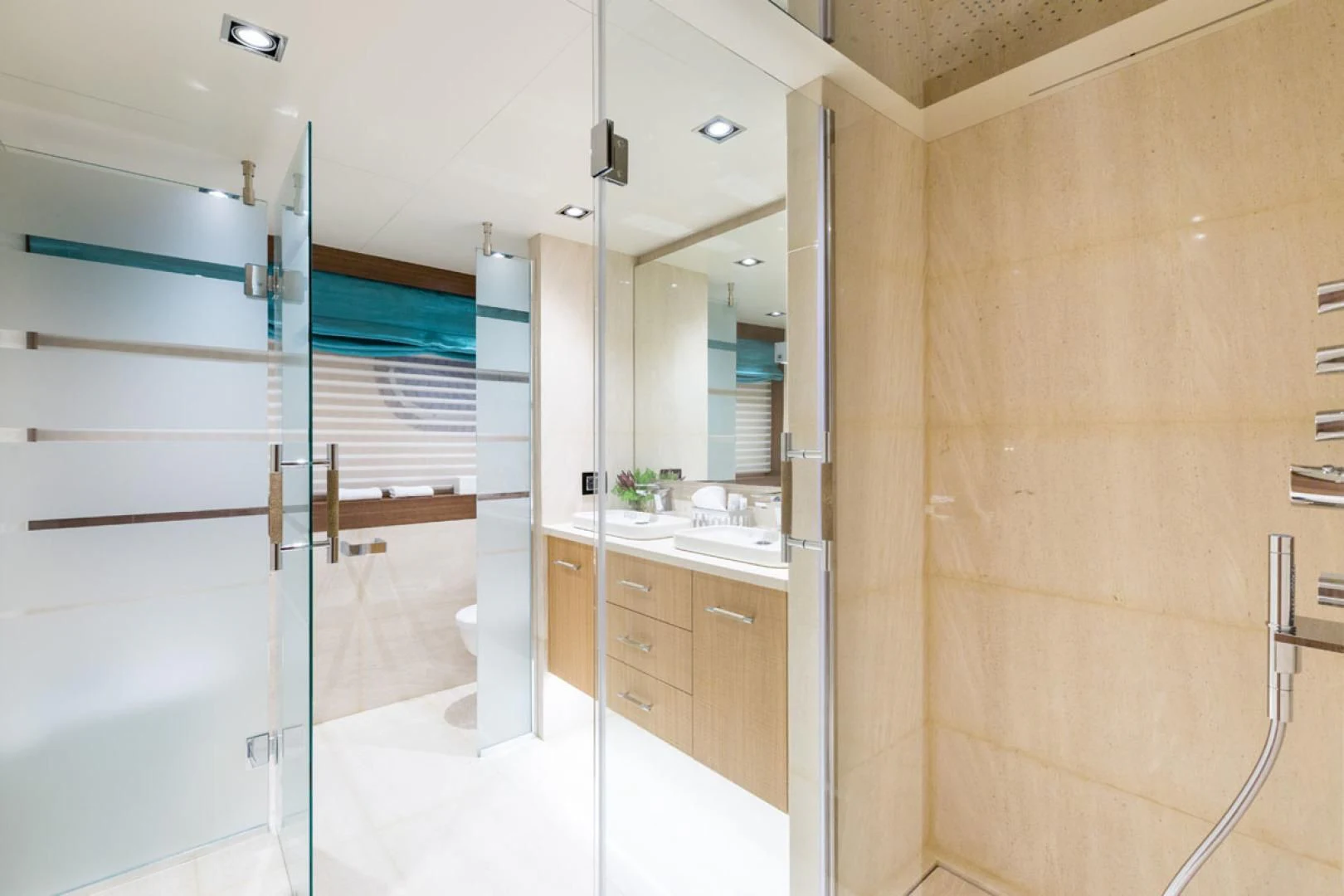a bathroom with a shower unit and sink aboard MAYBE Yacht for Sale