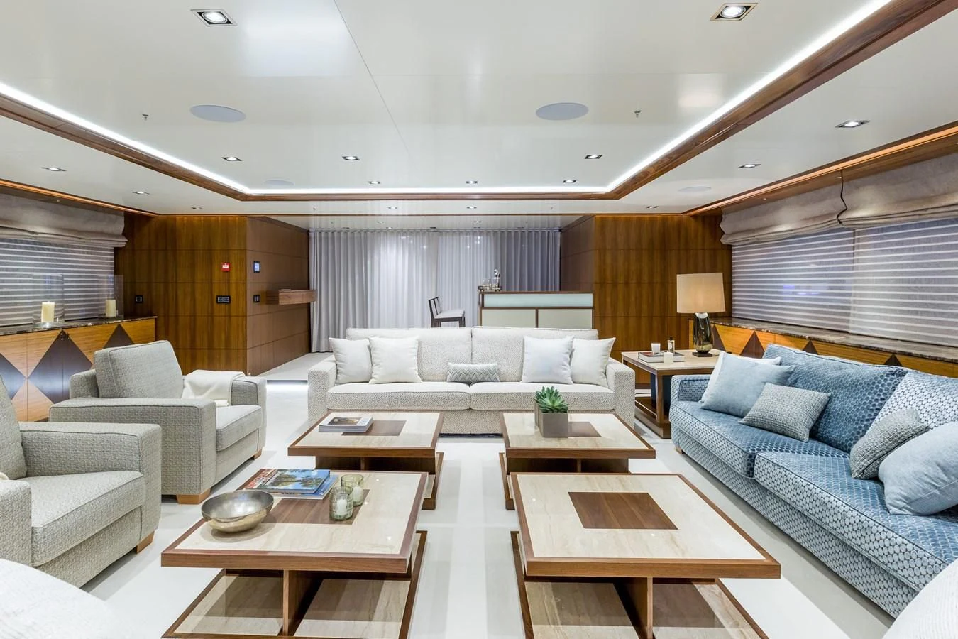a living room with a couch and a coffee table aboard MAYBE Yacht for Sale