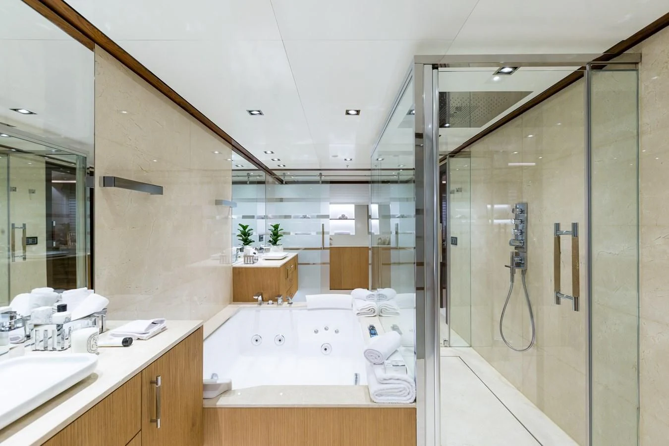 a bathroom with a large mirror aboard MAYBE Yacht for Sale
