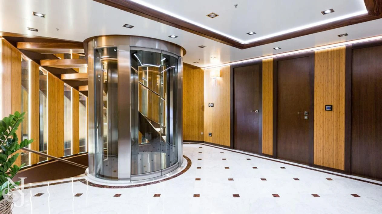 a large glass door aboard MAYBE Yacht for Sale