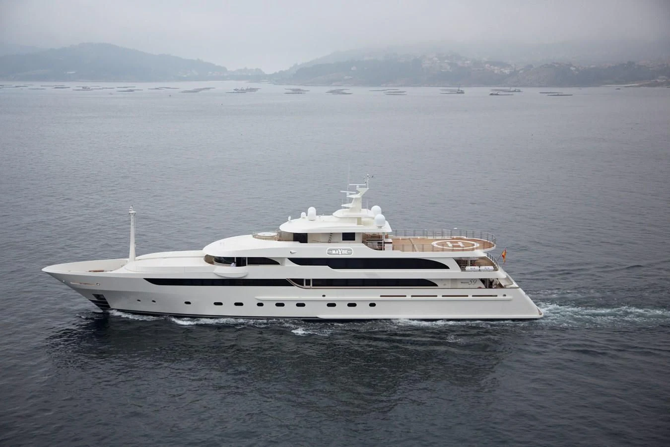 a white yacht in the water aboard MAYBE Yacht for Sale