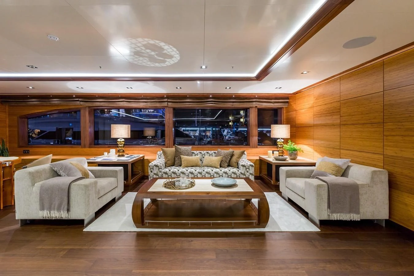 a living room with a large window aboard MAYBE Yacht for Sale