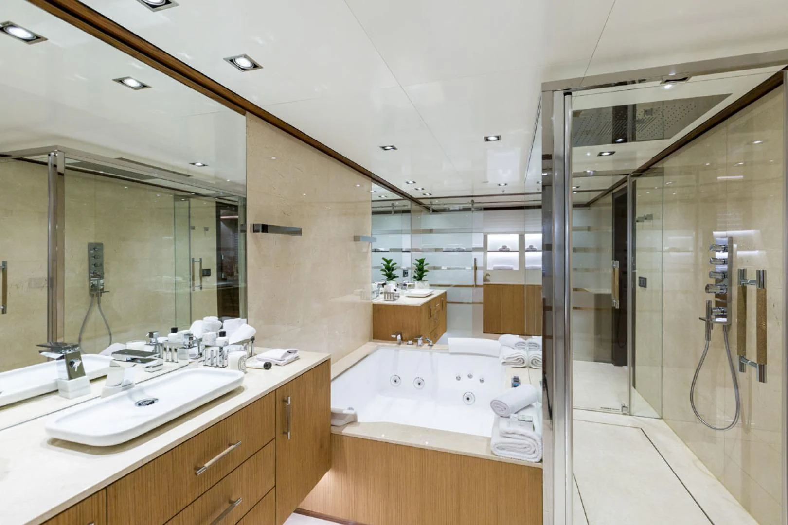 a bathroom with a large mirror aboard MAYBE Yacht for Sale