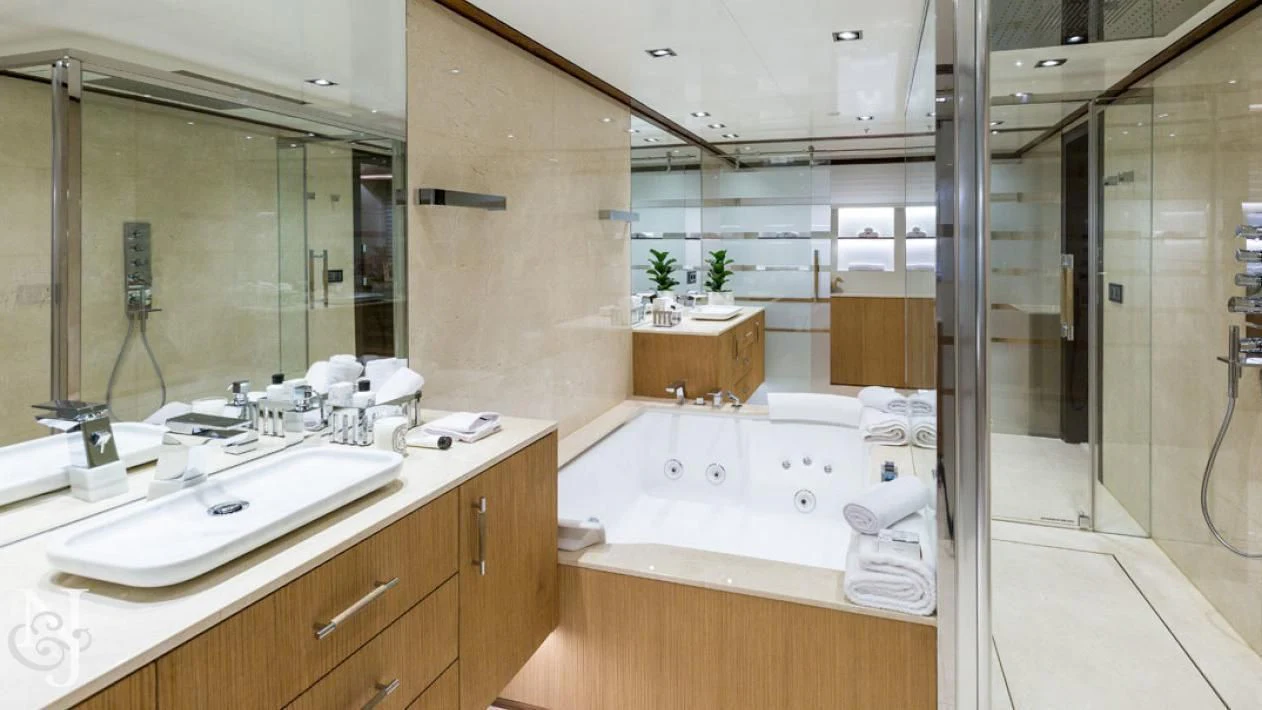 a bathroom with a large mirror aboard MAYBE Yacht for Sale