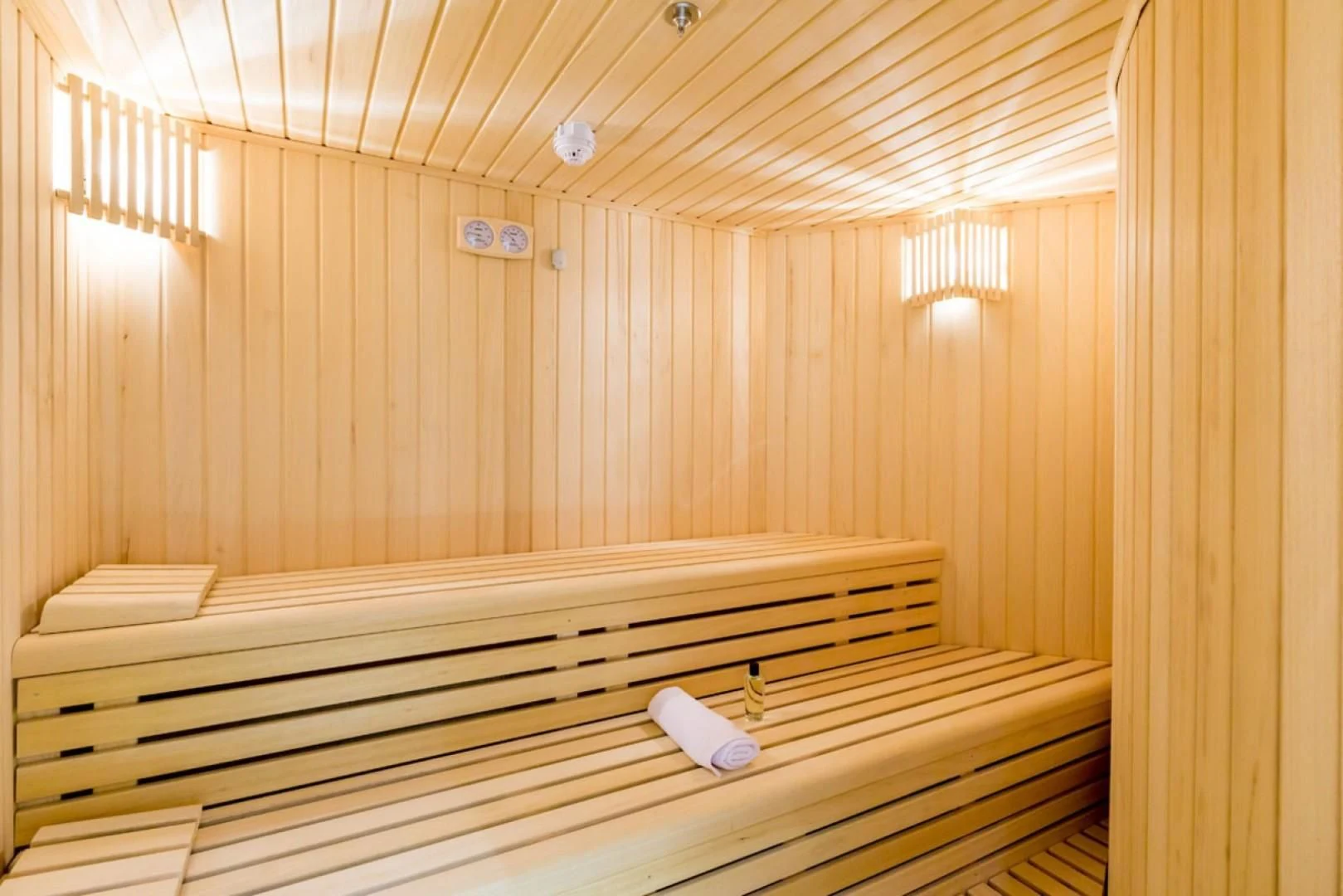 a room with wooden walls aboard MAYBE Yacht for Sale