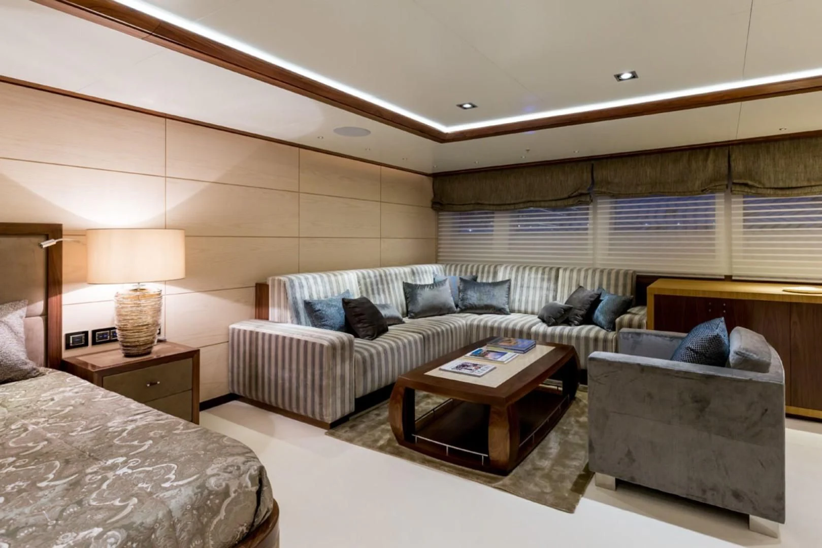 a living room with a couch and a coffee table aboard MAYBE Yacht for Sale