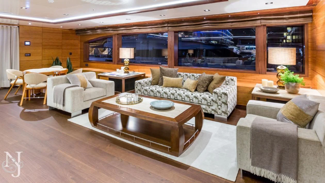 a living room with a large screen aboard MAYBE Yacht for Sale