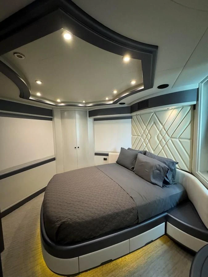 a bed in a room aboard AZIMUT 100/32 Yacht for Sale