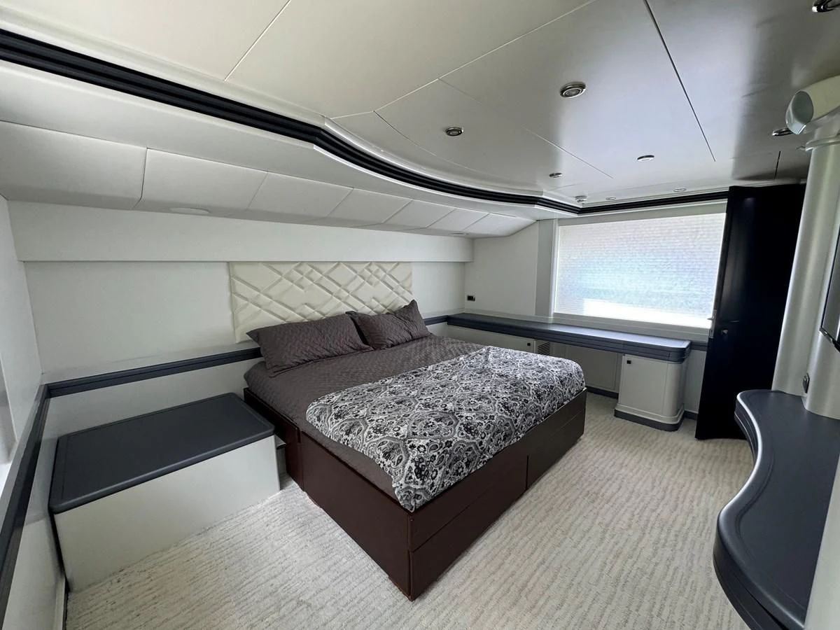 a bed in a room aboard AZIMUT 100/32 Yacht for Sale
