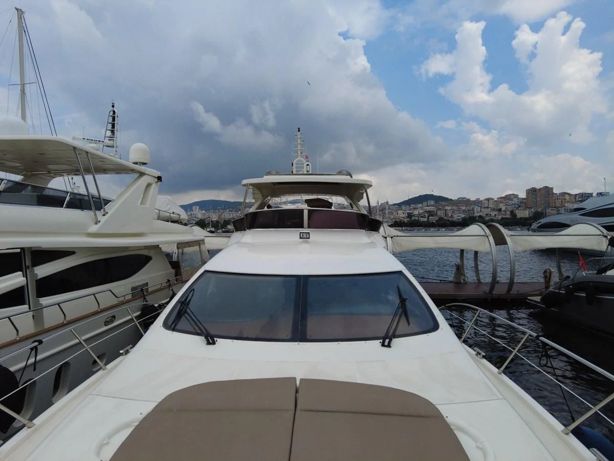 a group of boats are parked in a harbor aboard AZIMUT 100/32 Yacht for Sale